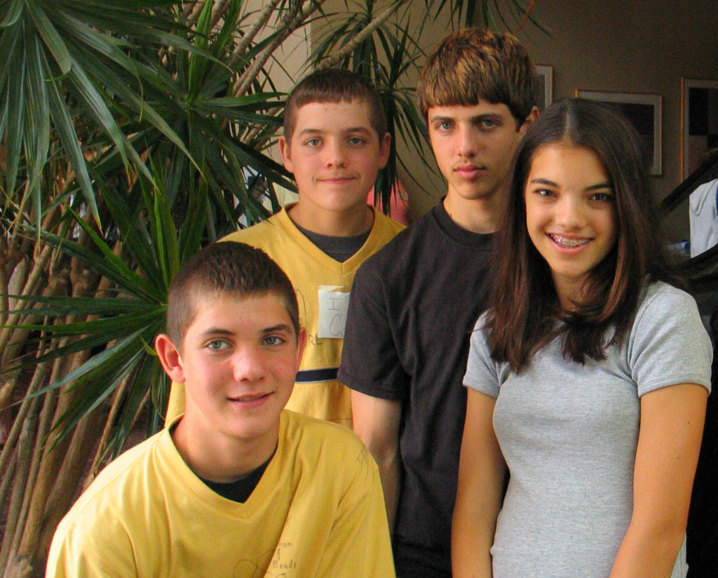 Four teenage kids