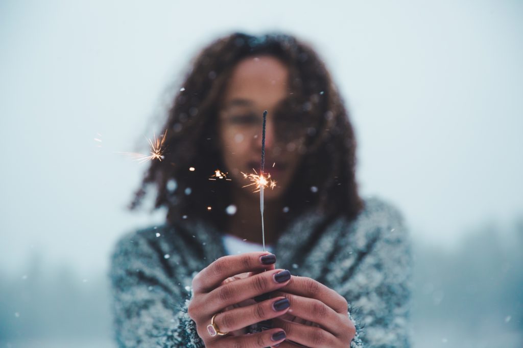 Teenage girl with sparkler