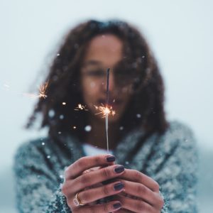 Teenage girl with sparkler
