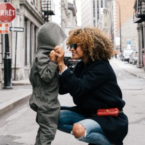 Mom and her child on a street of Montreal