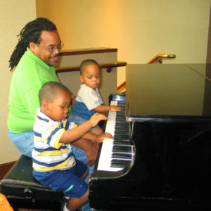 family at piano