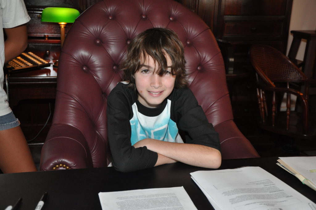 boy in big chair