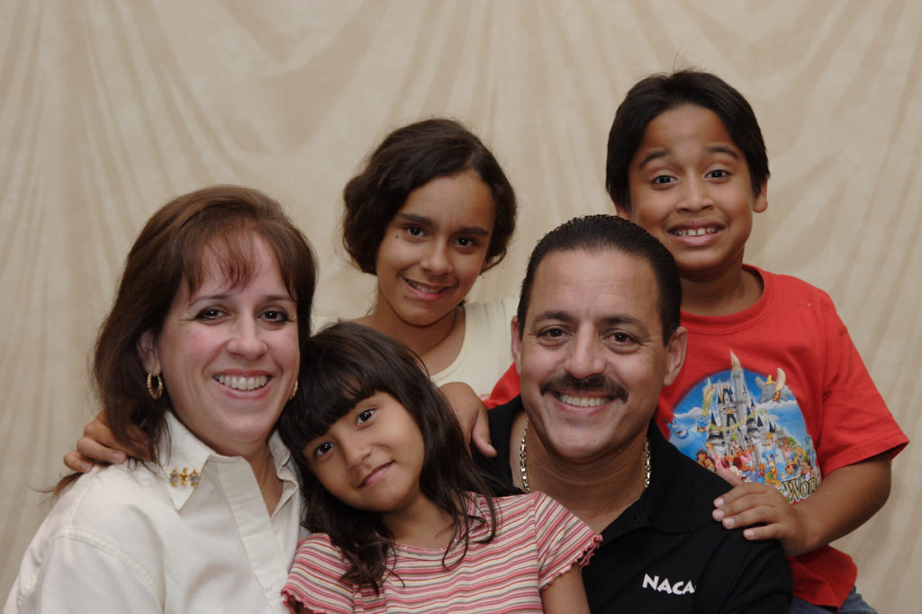 Parents with three children
