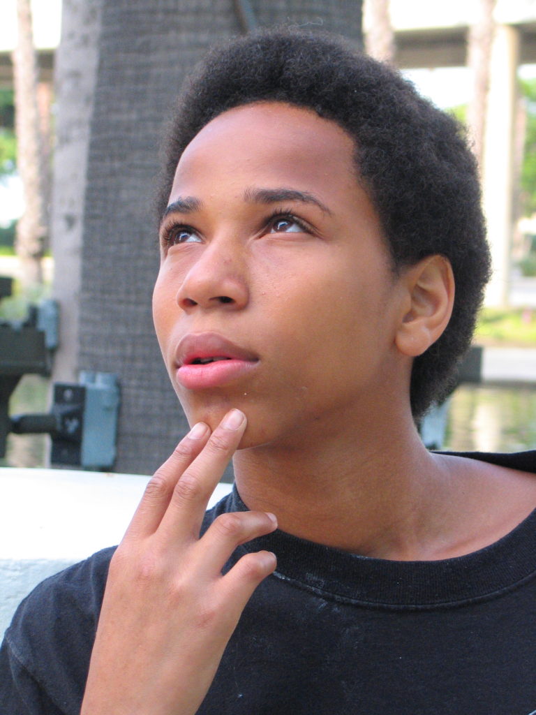 thoughtful teenage boy